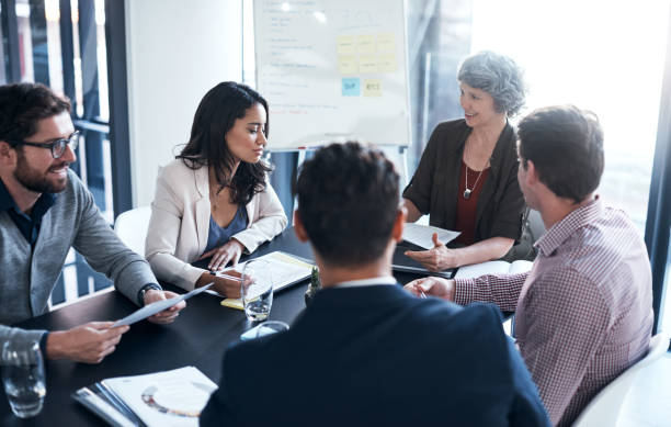 istock Discussing way to enhance their company's growth 960164070