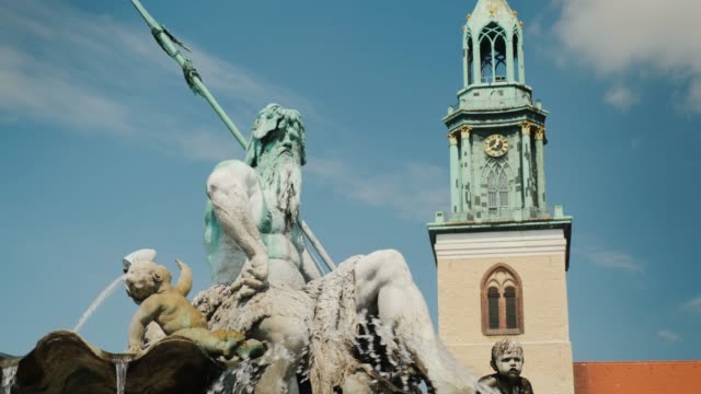 Berlin, Germany, May 2018: Berlin Attractions - Neptune Fountain