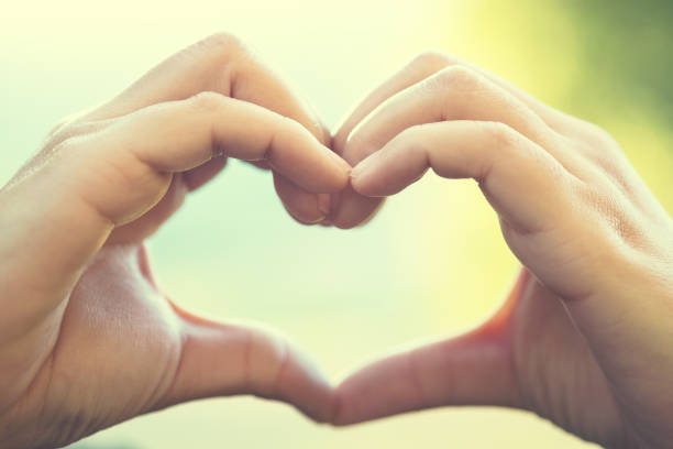 istock Hands making a heart symbols for lover in valentine's day 960166778