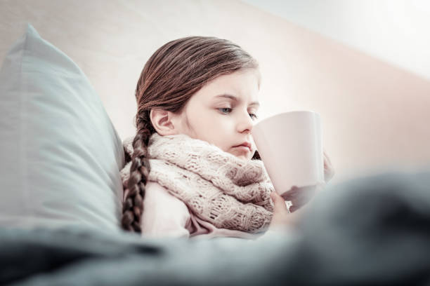 istock Serious child thinking about her friends 960172966