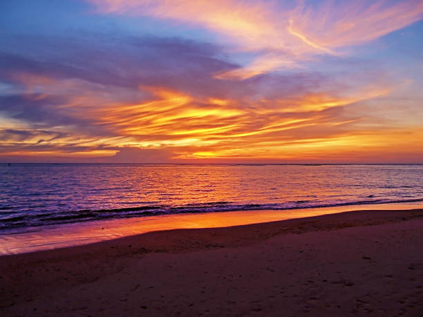 istock beach sunset at evening time with twilight cloudy sky 960175842
