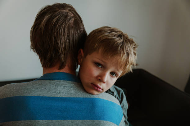 istock Father comforting sad child, parenting, sorrow 960176148