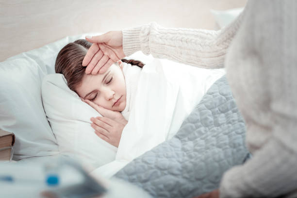 istock Tired girl sleeping on her bed 960176506