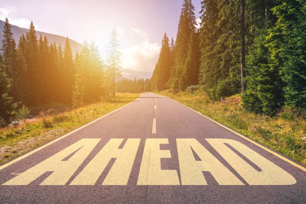 istock Ahead word written on road in the mountains 960177614