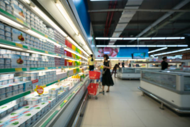Abstract blur supermarket and retail store in shopping mall interior for background