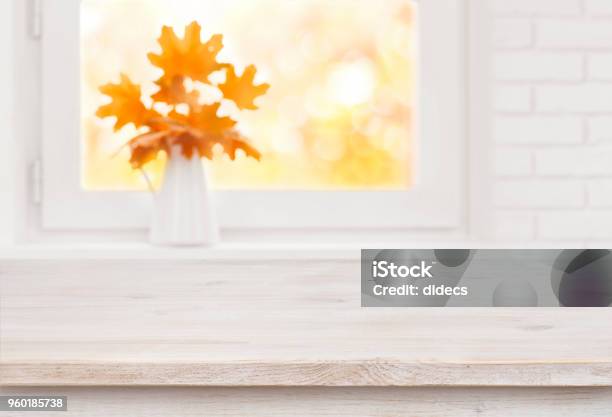Bleached Wooden Table On The Background Of White Autumn Windowsill Stock Photo - Download Image Now