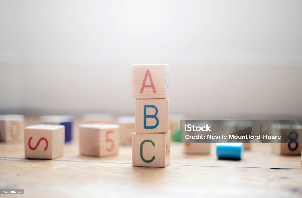 ABC toy blocks Toy building blocks stacked to spell out ABC Toy Block Stock Photo
