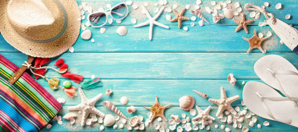 istock Beach Accessories With Seashells On Wooden Board 960189678