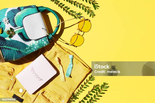 Flat Lay Of Female Holiday Clothing And Accessories Stock Photo - Download Image Now