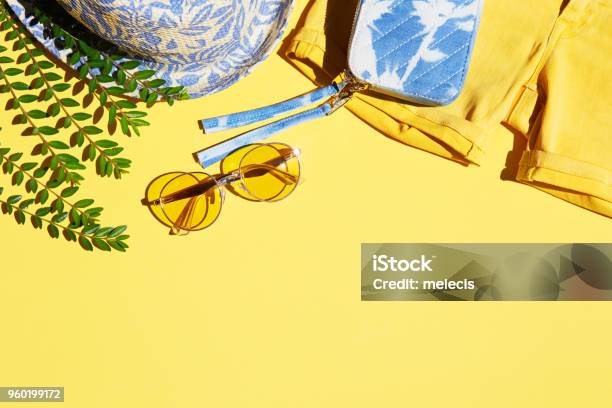 Flat Lay Shot Of Female Holiday Clothing And Accessories Stock Photo - Download Image Now