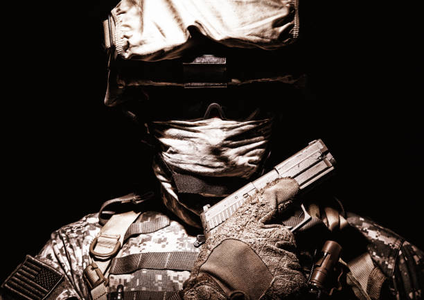 istock Portrait of commando with service pistol in hand 960205052