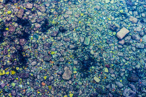 istock Crystal clear sea with rocks as abstract background 960205136