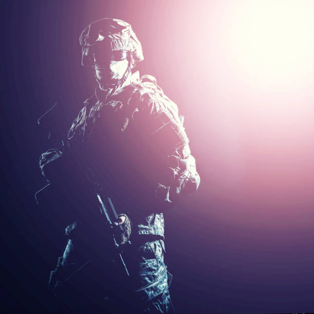 istock Infantry rifleman standing with weapon in darkness 960205166