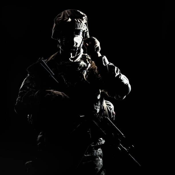 istock Armed infantryman during night military operation 960205170