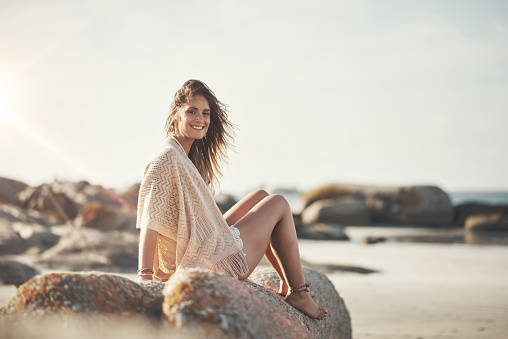 Portrait of an attractive young woman at the beach