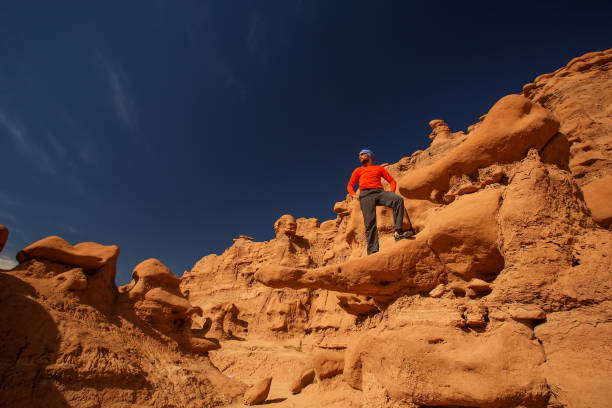 istock Hiker visit Goblin valley state park in Utah, USA 960209130