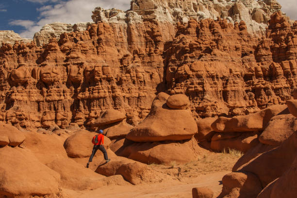 istock Hiker visit Goblin valley state park in Utah, USA 960209220