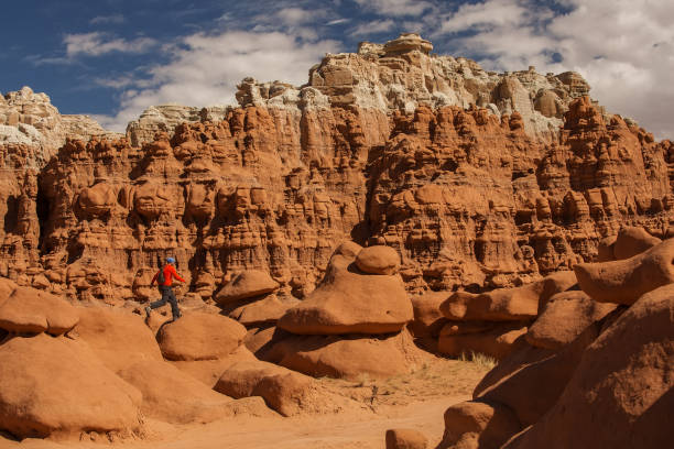 istock Hiker visit Goblin valley state park in Utah, USA 960209222