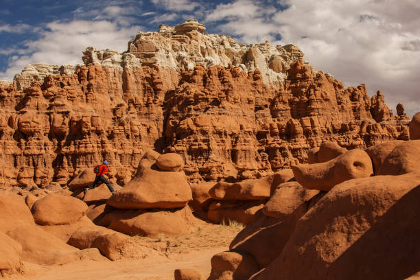 istock Hiker visit Goblin valley state park in Utah, USA 960209228