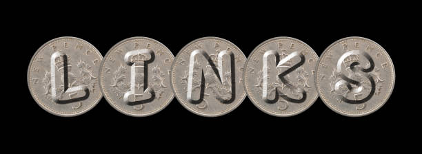 istock LINKS written with old British coins on black background 960209722