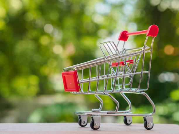 istock Shopping trolley on bokeh background. Shopping concept. 960212176