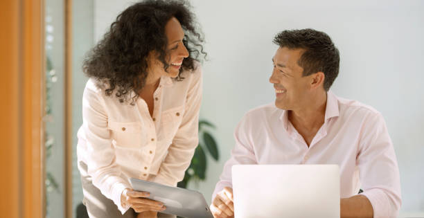 istock Cheerful couple looking at each other 960212952