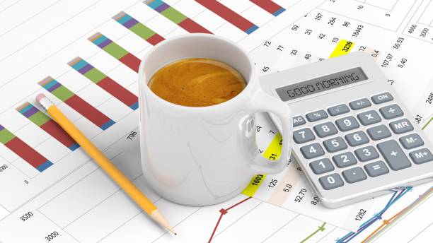 istock Cup of coffee with office paperwork 960213660