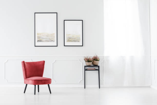 istock Red armchair against white wall 960214038