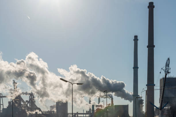 istock Industrial plant with big smoke stacks 960216806