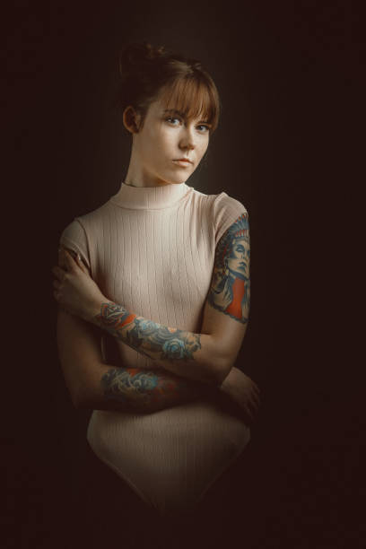 istock Beautiful young woman with tattoo 960216996