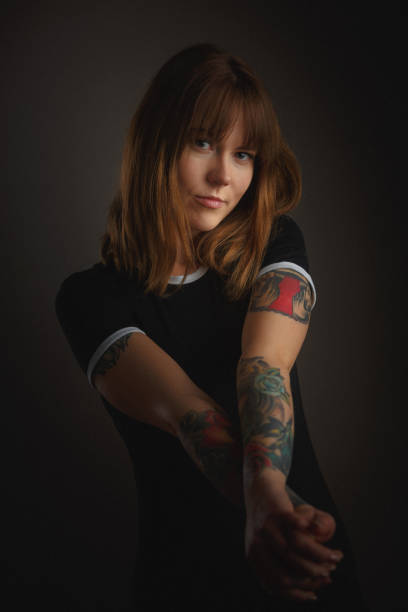 istock Beautiful young woman with tattoo 960217120