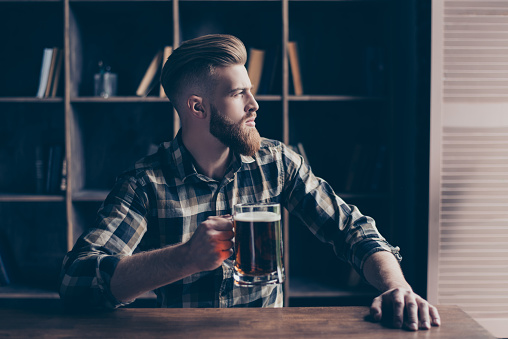 People fail coziness holiday concept. Profile side half-faced portrait of serious gloomy minded nervous thinking pondering pensive dreamy handsome manager enjoying cool fresh beer at bar counter