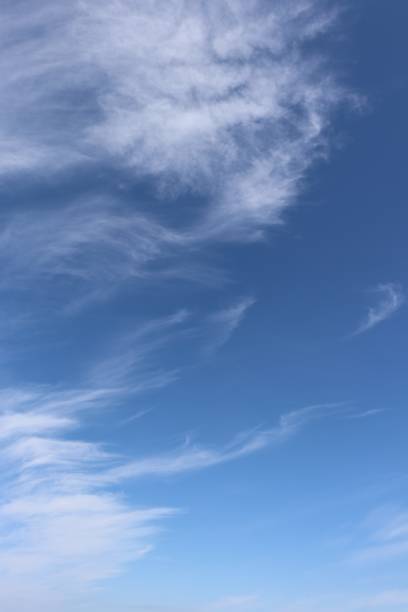 istock Close-up of fluffy white clouds against blue sky 960218262