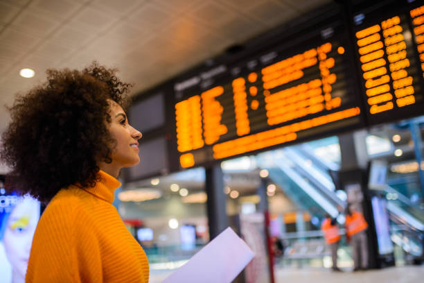 istock Woman at the train station. 960221076