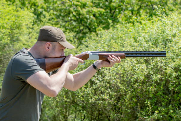 istock Man with gun hunting 960225646