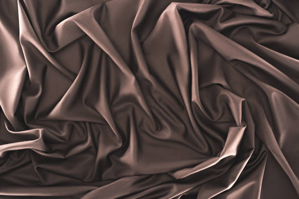 istock full frame of folded dark silk cloth as background 960226658