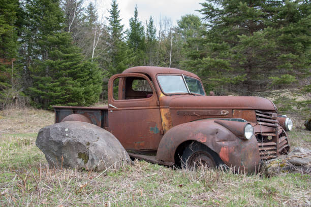 istock Old Rusty Truck in field 960231974