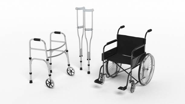 Black disability wheelchair Black disability wheelchair, crutch and metallic walker isolated on white mobility walker stock pictures, royalty-free photos & images