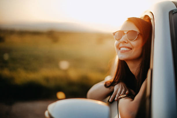 istock Girl watching sunset on a roadtrip 960240994