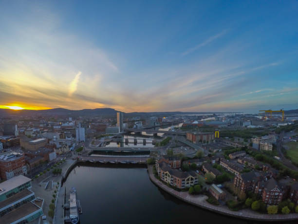 Aerial view on river and buildings in belfast northern ireland. Sunset over city Cityscape belfast photos stock pictures, royalty-free photos & images
