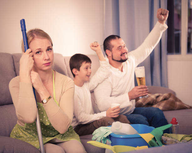 istock Upset woman with cleaning equipment 960245296