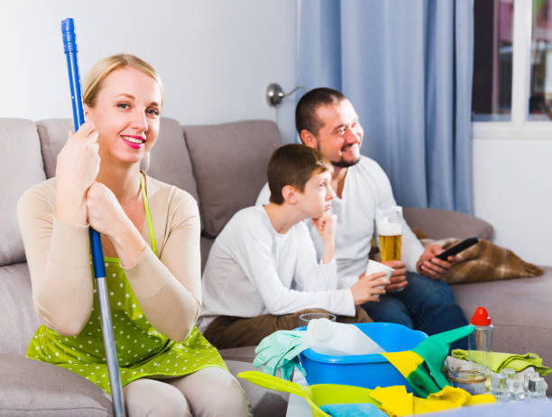 istock Smiling woman dressed for cleaning 960245308