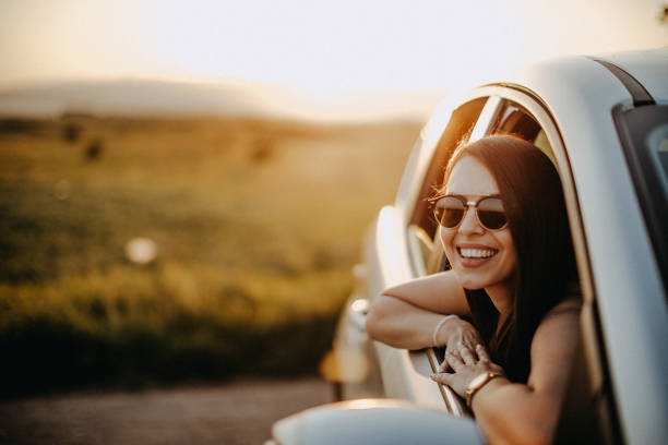 Sunset on the road Sunset on the road only young women stock pictures, royalty-free photos & images