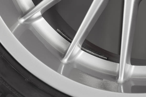 istock Part of silver alloy wheel with tire 960249266