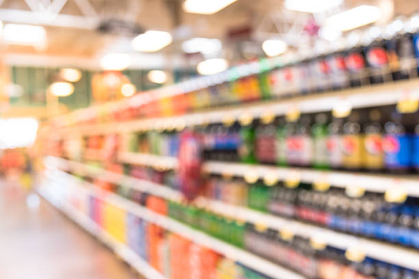 istock Abstract blurred soft drinks aisle in American store 960251924