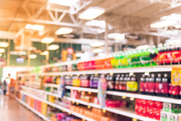 istock Abstract blurred soft drinks aisle in American store 960252054