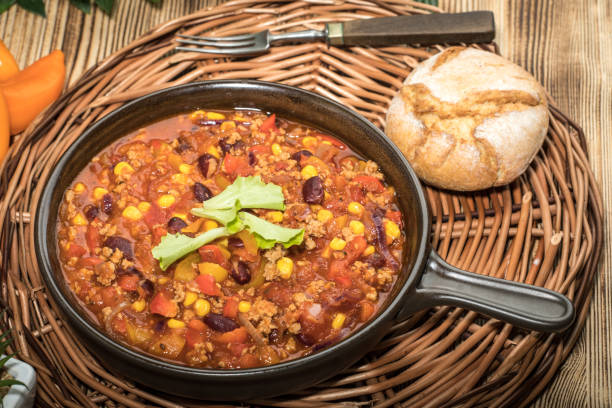 istock Chili con carne in a clay pan. 960252354
