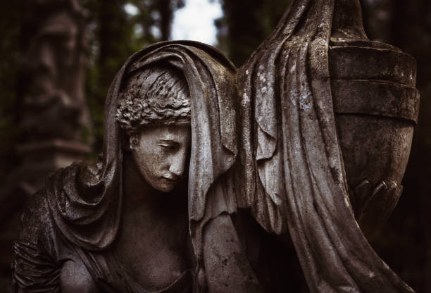 istock statue on grave in the old cemetery 960252452