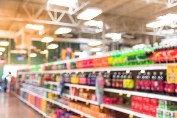 istock Abstract blurred soft drinks aisle in American store 960252644