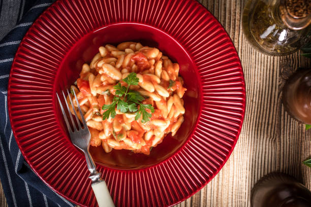 istock Cavatelli pasta with fresh tomato sauce. 960254806